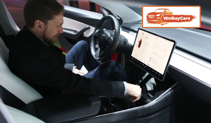 Is Using a Tesla Screen While Driving Illegal?